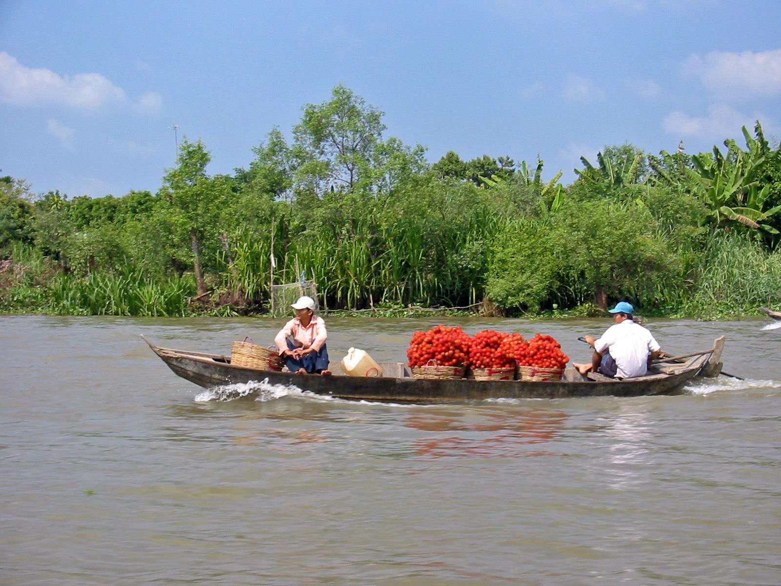 Lode na rieke v delte Mekongu